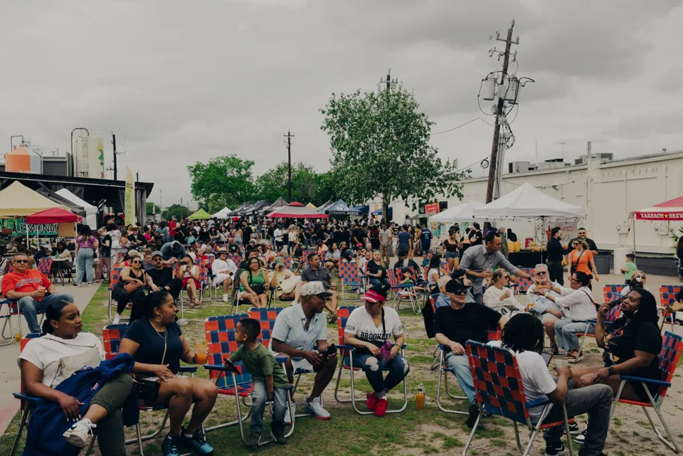 A large crowd visiting food vendors at the Houston Sazón festival